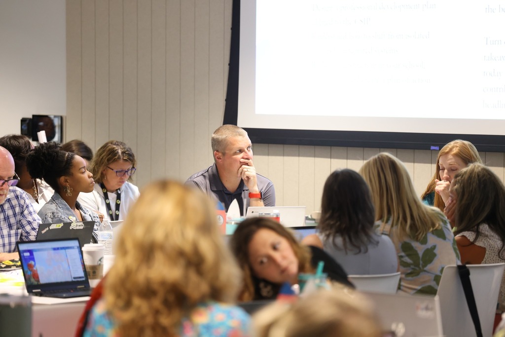 Staff learning at a pd training session.