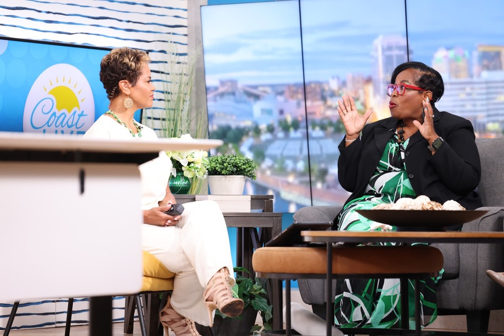 Lisa speaking with Coast Live Host.