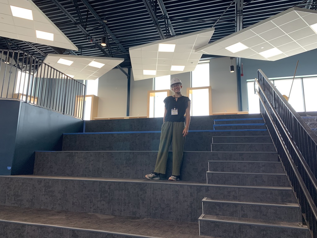 Marcy in a new building.
