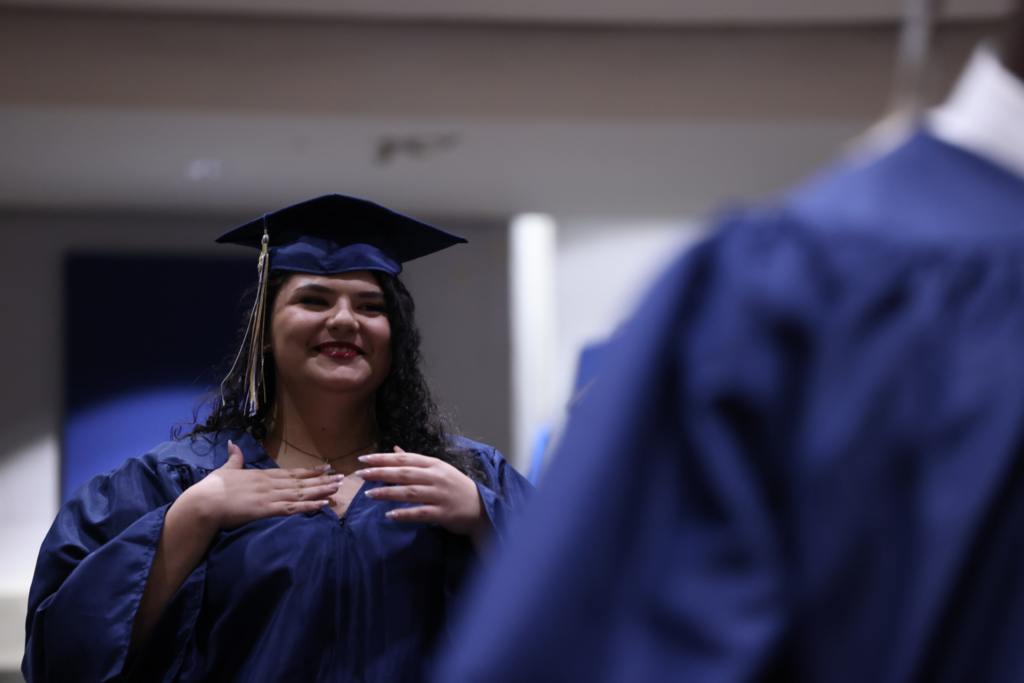 Graduate smiling.