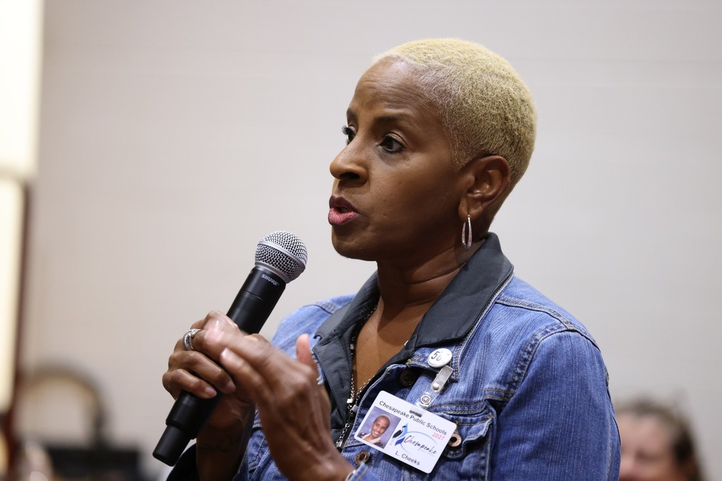 admin speaking in microphone
