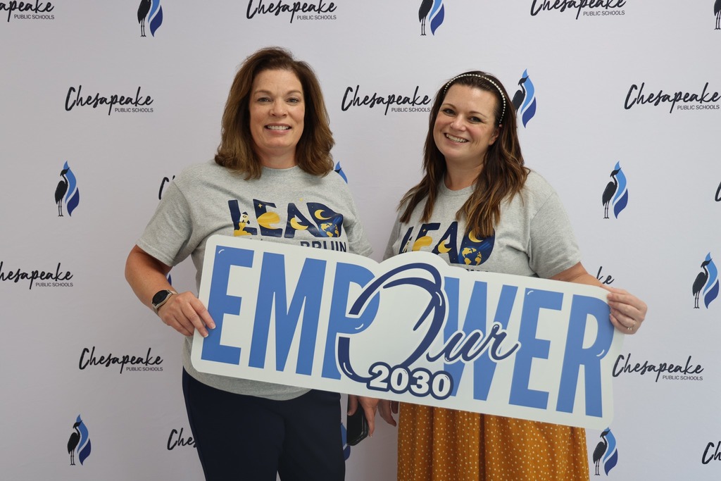 two admins with empower sign