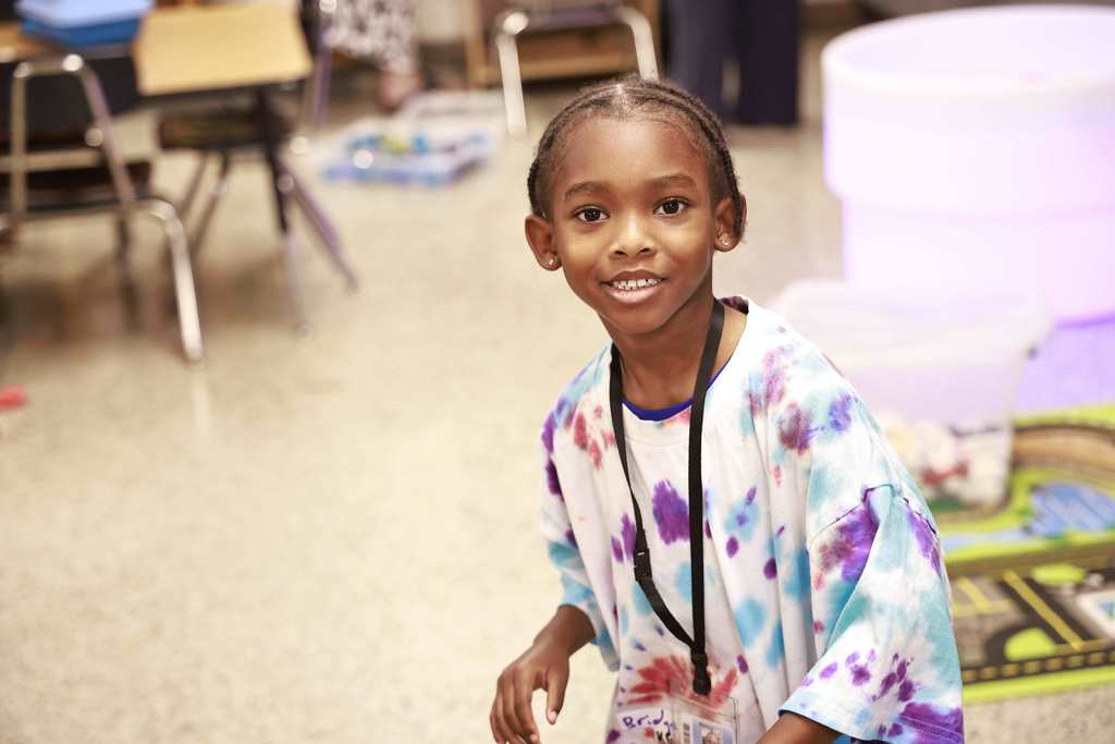 A student plays with toys during the Bridge to Kindergarten summer learning program