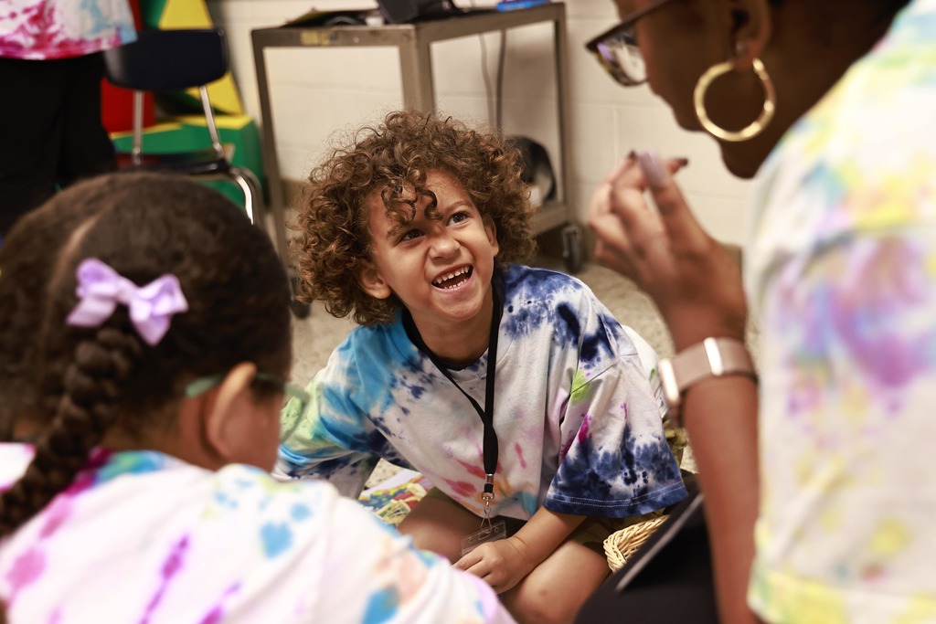 A student plays with toys during the Bridge to Kindergarten summer learning program