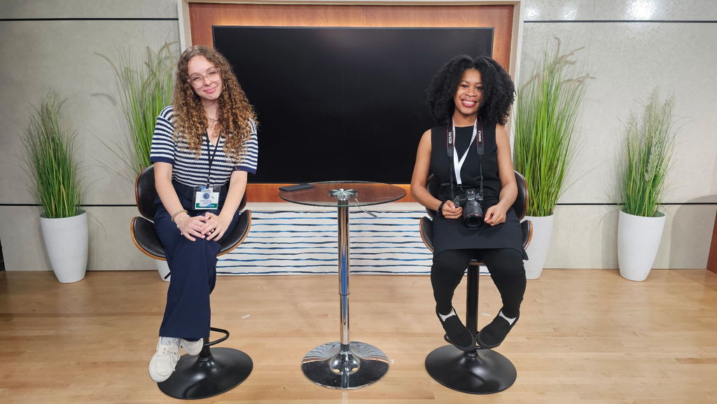 Amelia and Morgan smiling on the set of Coast Live