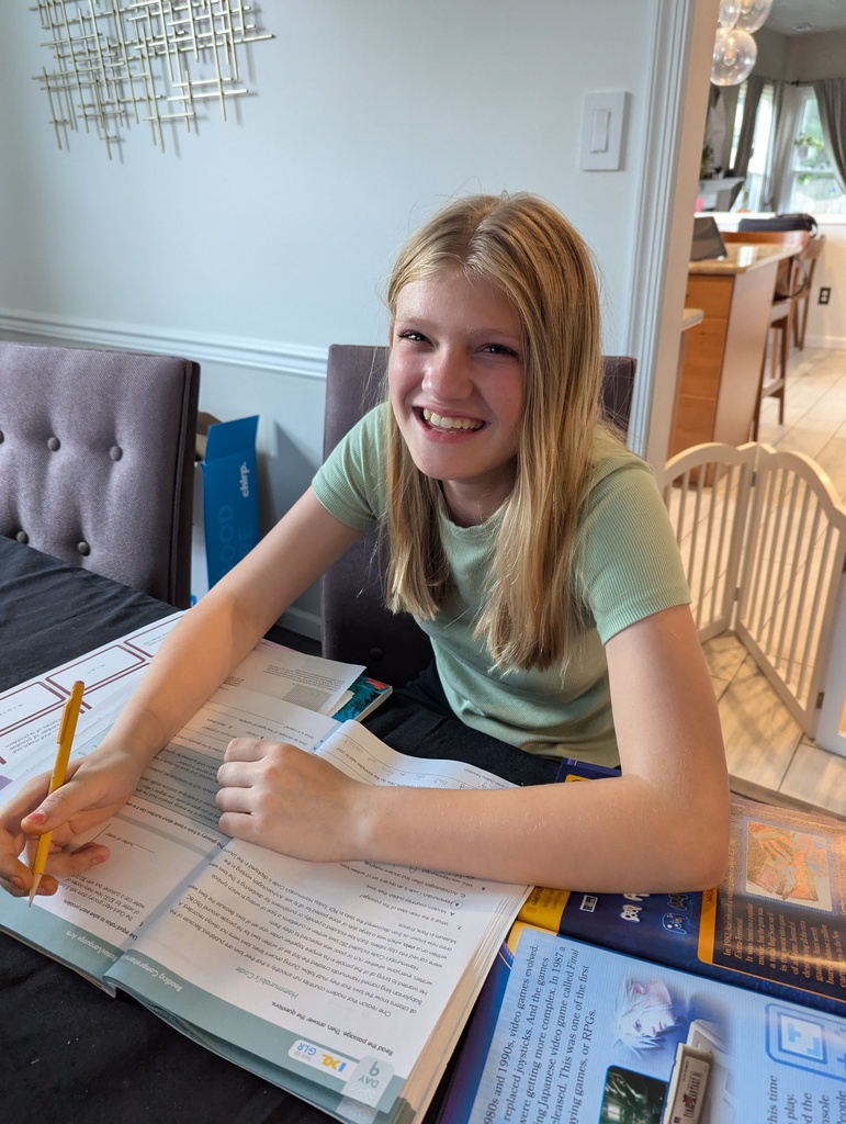 female student working in workbook