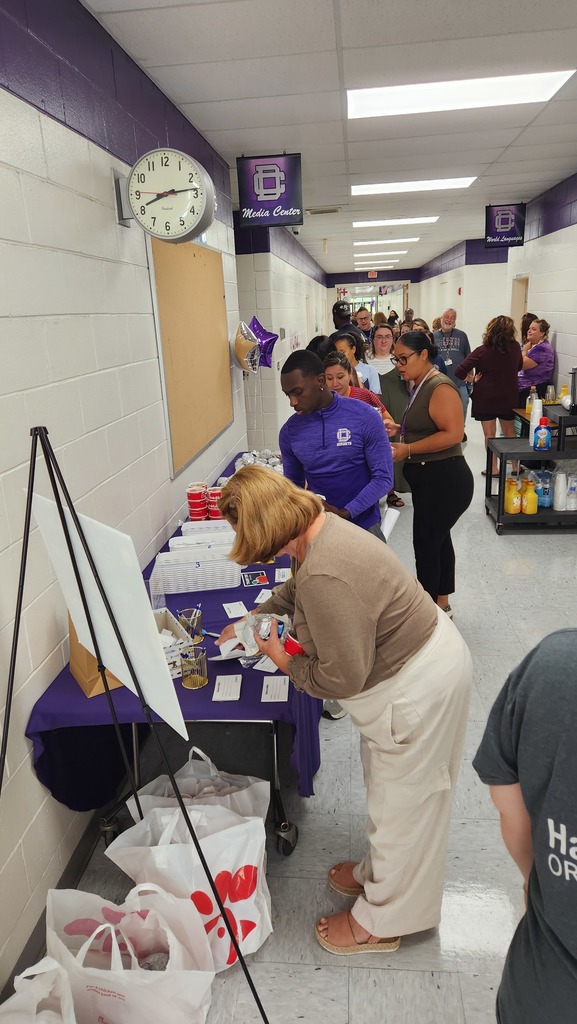 Hatcher and Frey Breakfast. Teachers in line for breakfast.