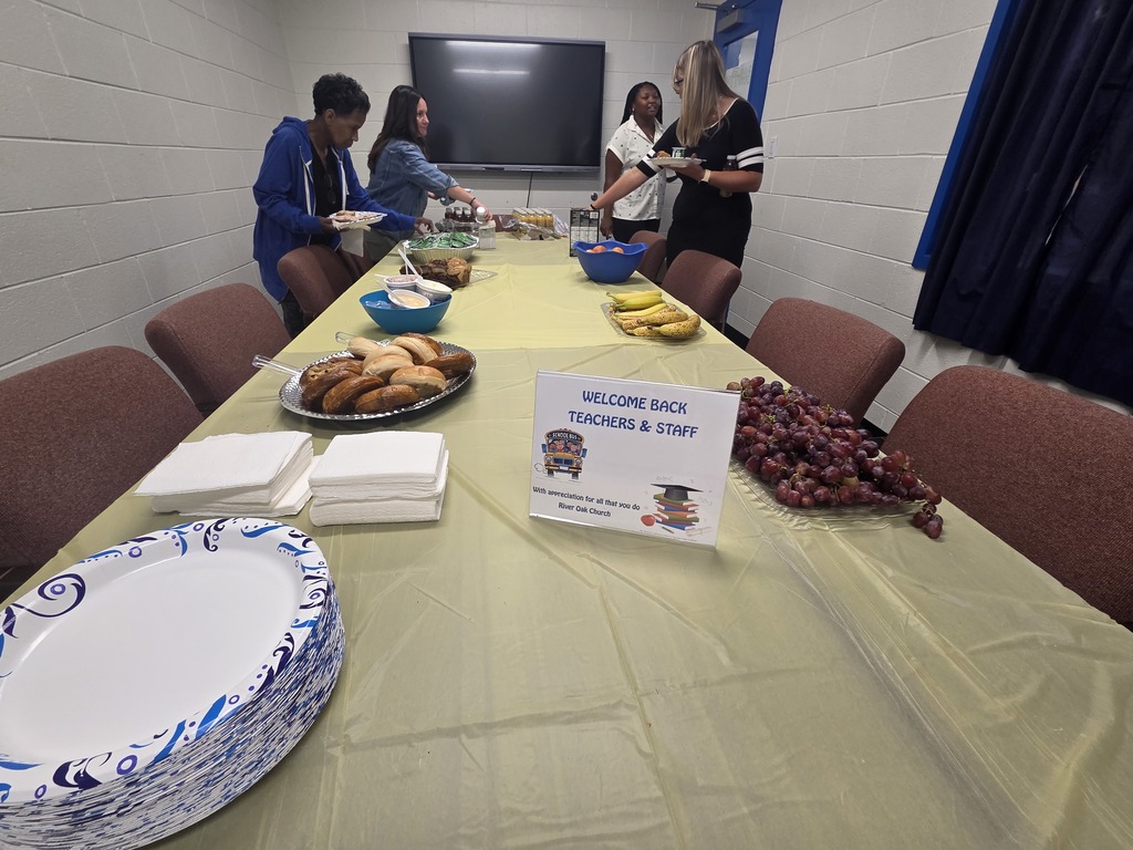 Teachers choosing donated breakfast items