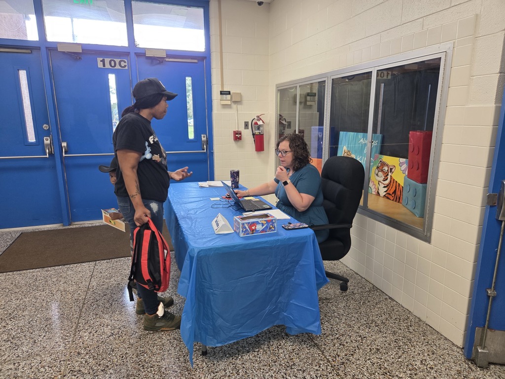Mrs. Steadman looking up bus information.