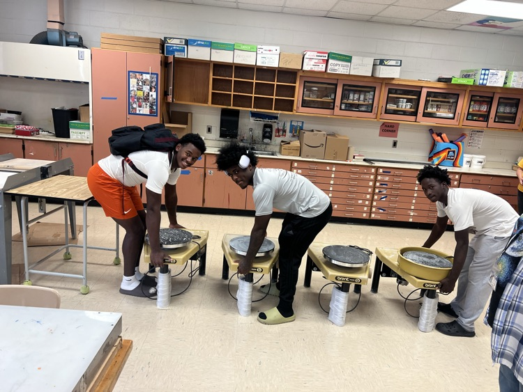 students helping teachers 