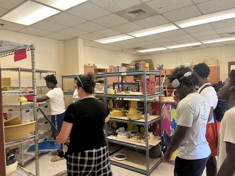 students helping teachers 