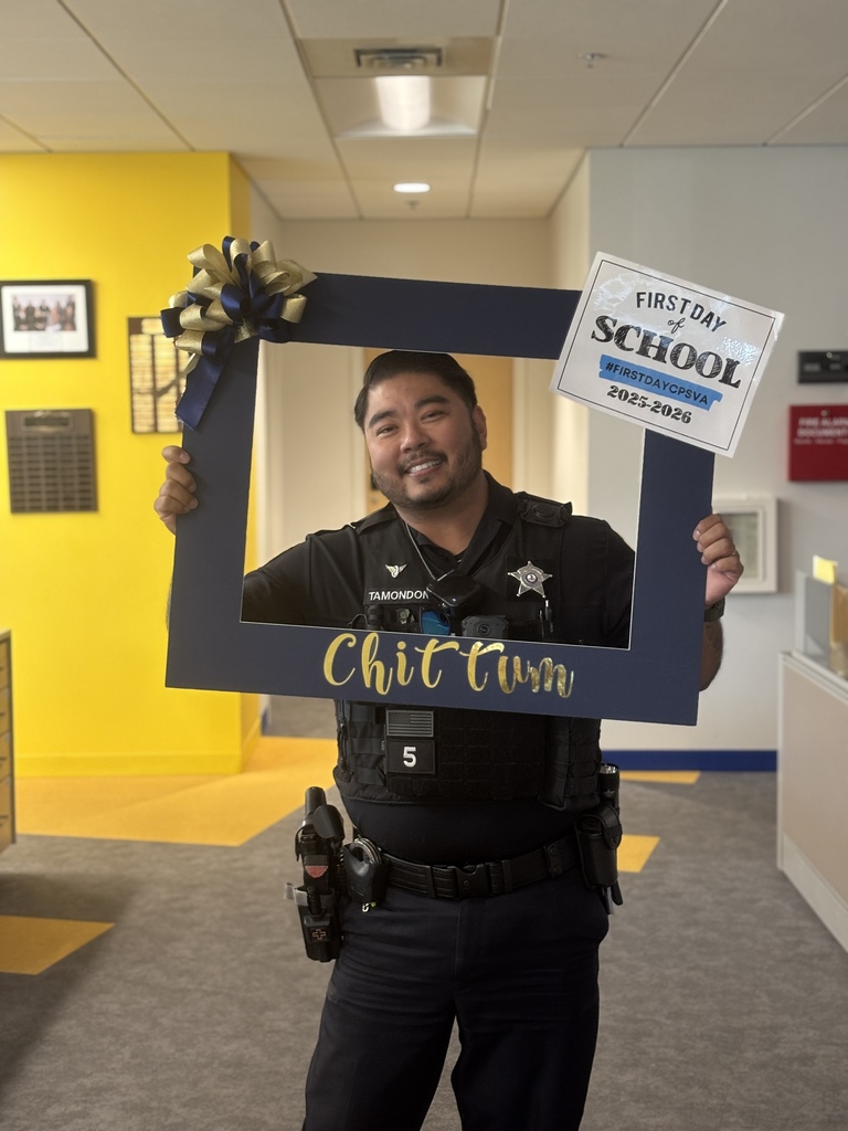 Our SRO officer Tamondong holding our First day of school frame