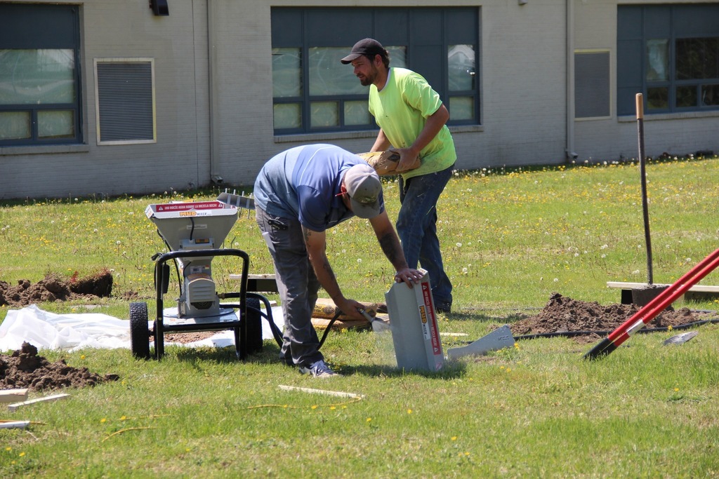 People working with landscaping
