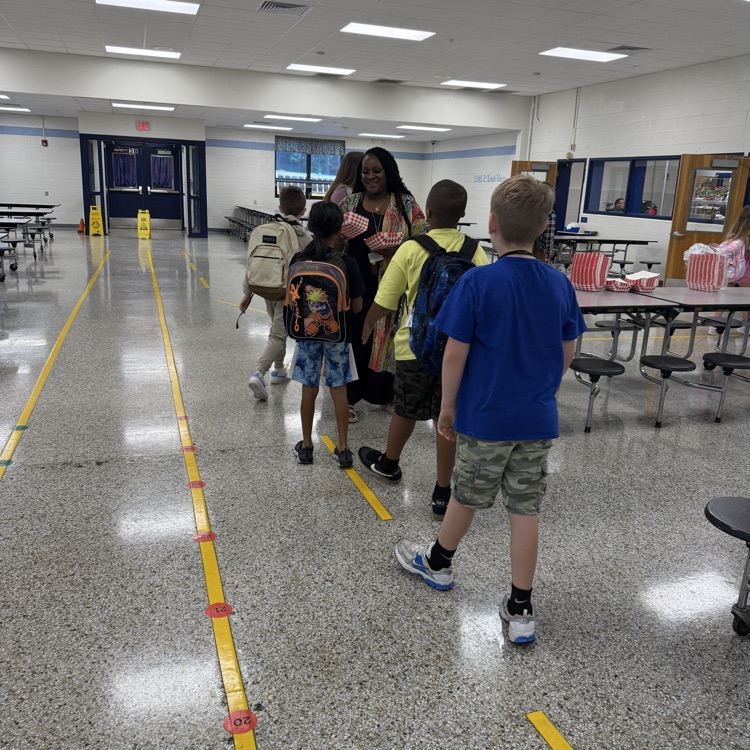 cafeteria students getting breakfast