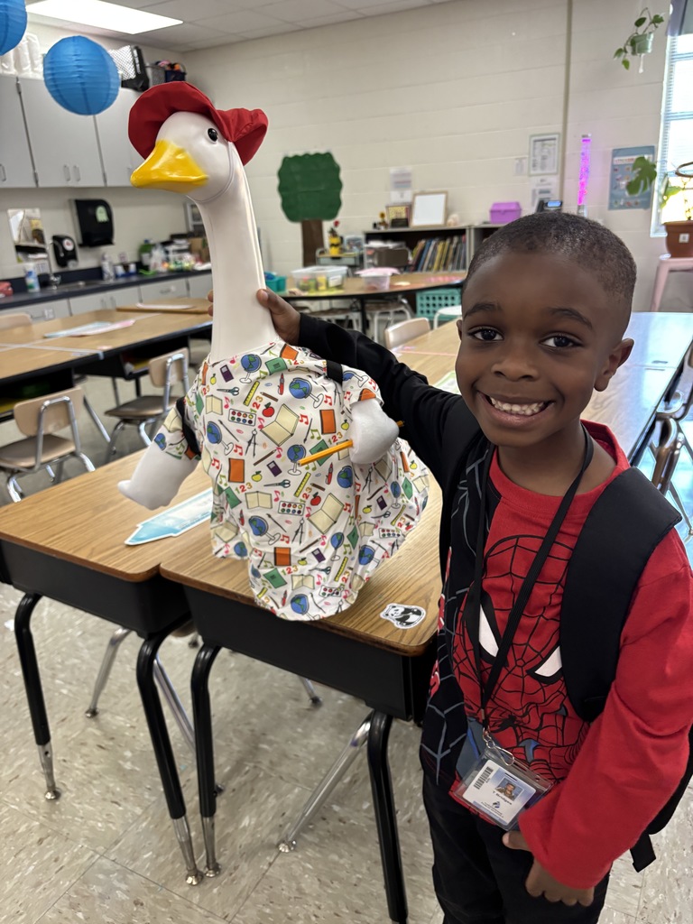 Kindergartner with class goose