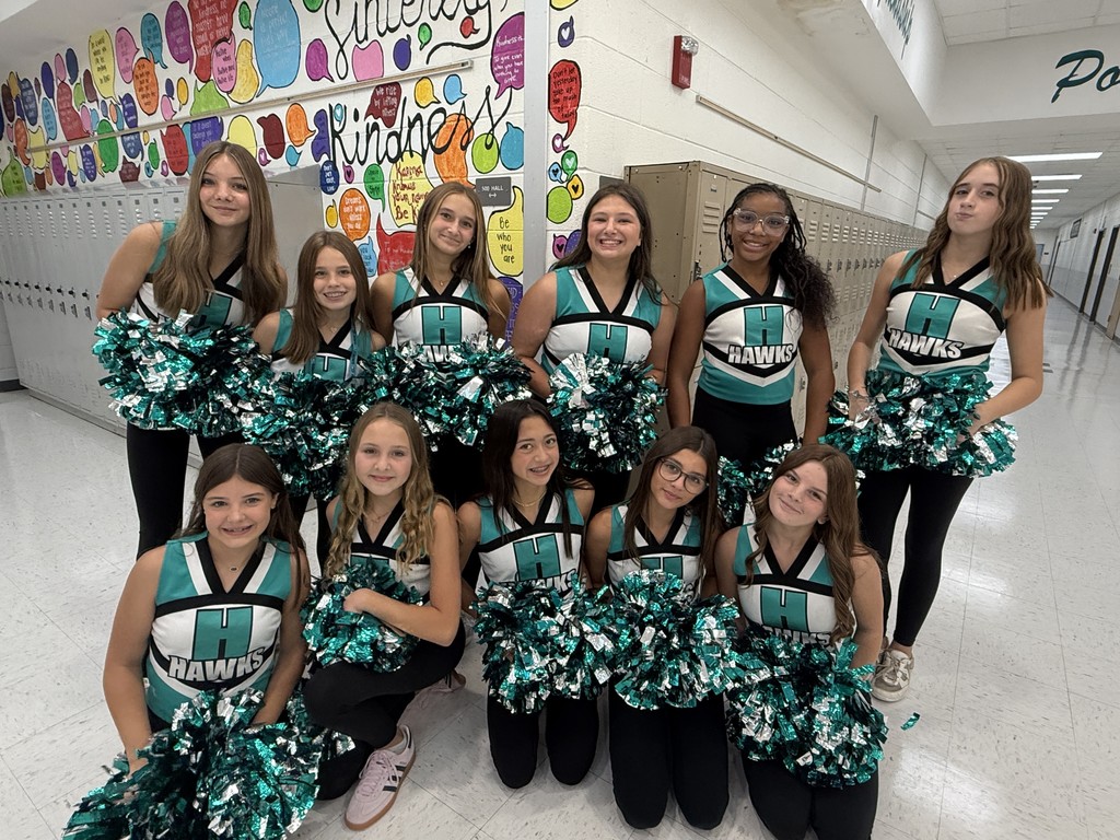 Cheerleaders in hallway