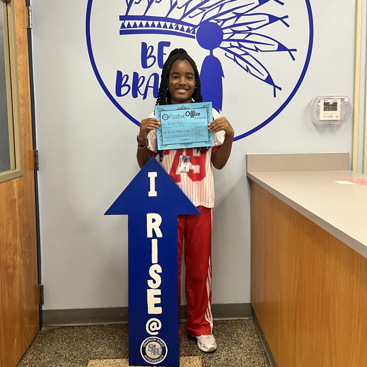 Student with Positive Office Referral and the I RISE sign