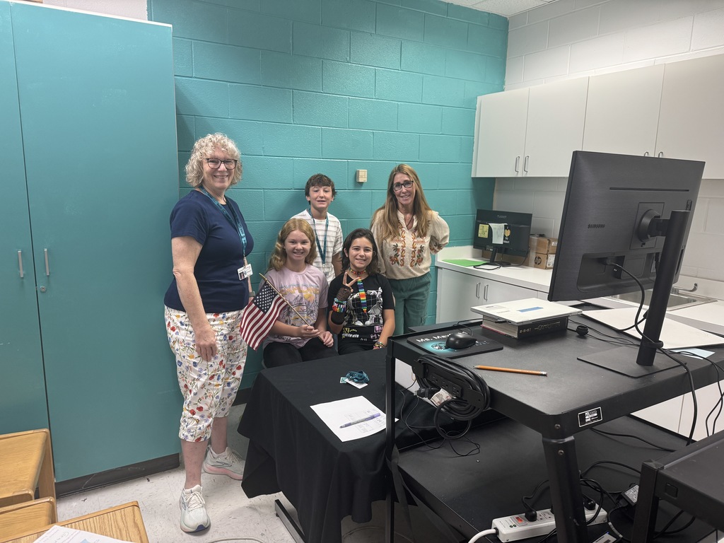 students and teachers in a filming area