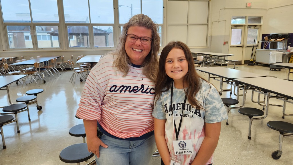 Mrs. Short and Student wearing red, white, and blue 
