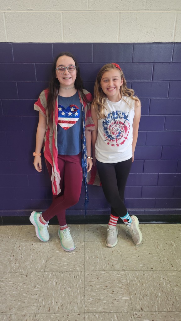 Two girls wearing Red, White, and Blue
