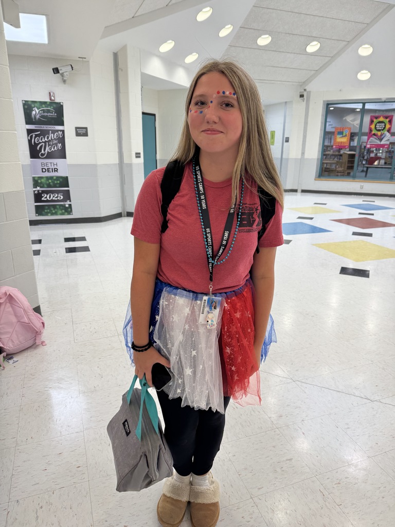 students in red, white, and blue for patriot's day