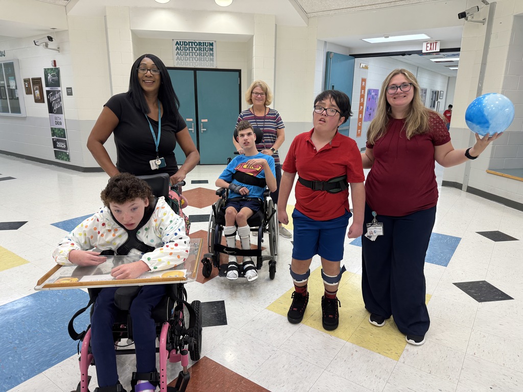 students in red, white, and blue for patriot's day