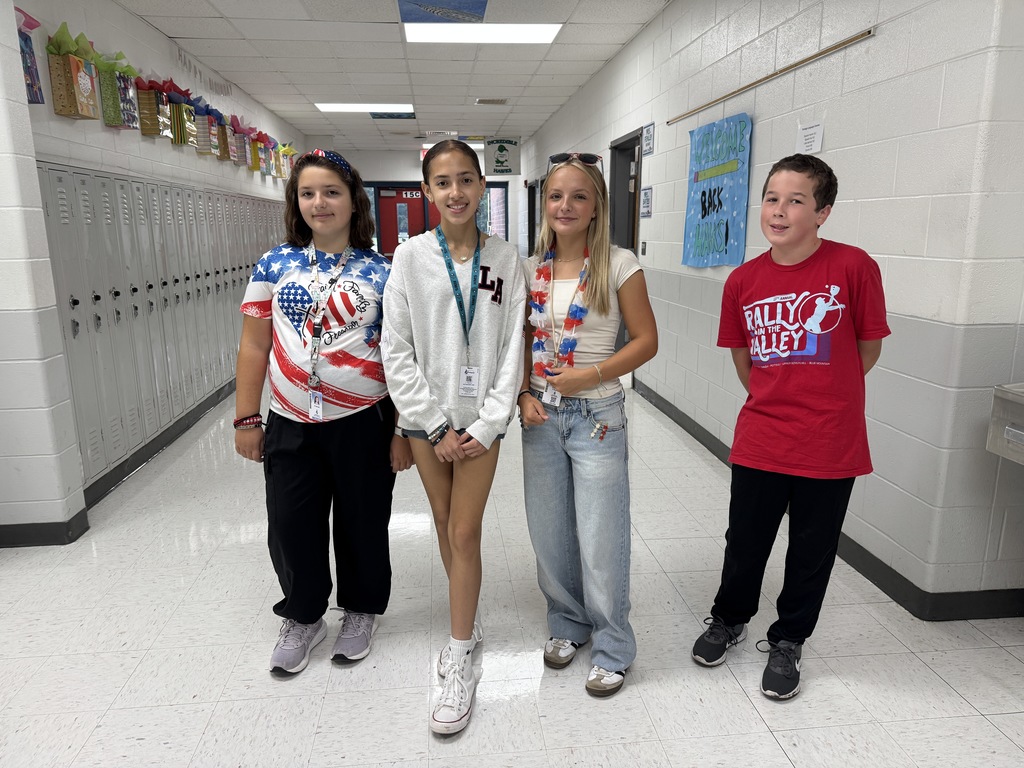 students in red, white, and blue for patriot's day