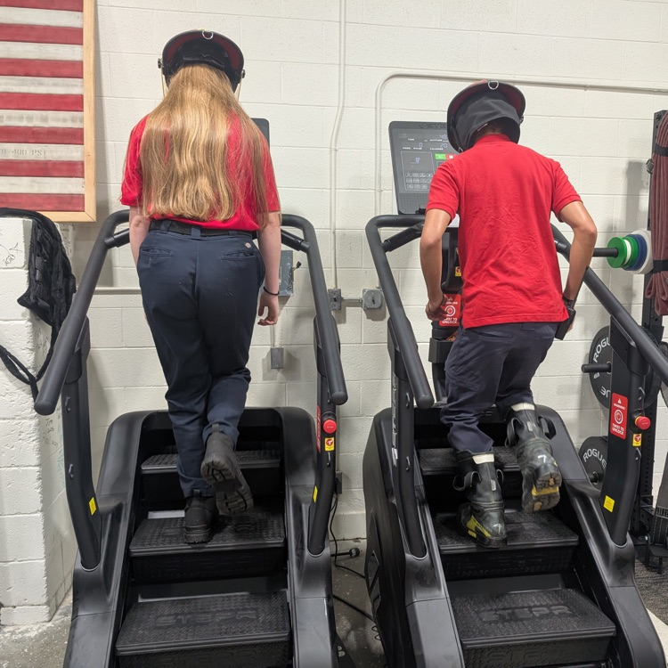 firefighting students on the stairclimber 