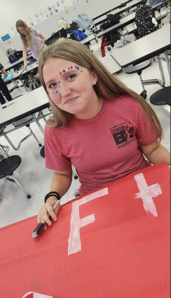 student making posters