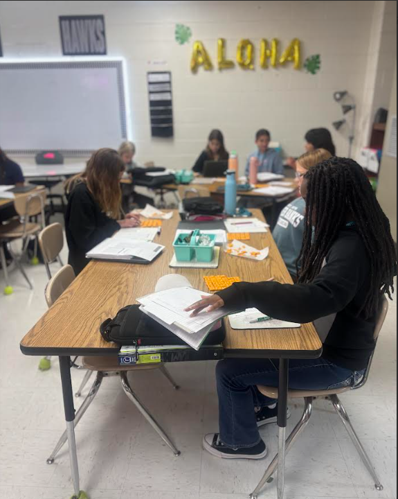 students in math working with cheese-its