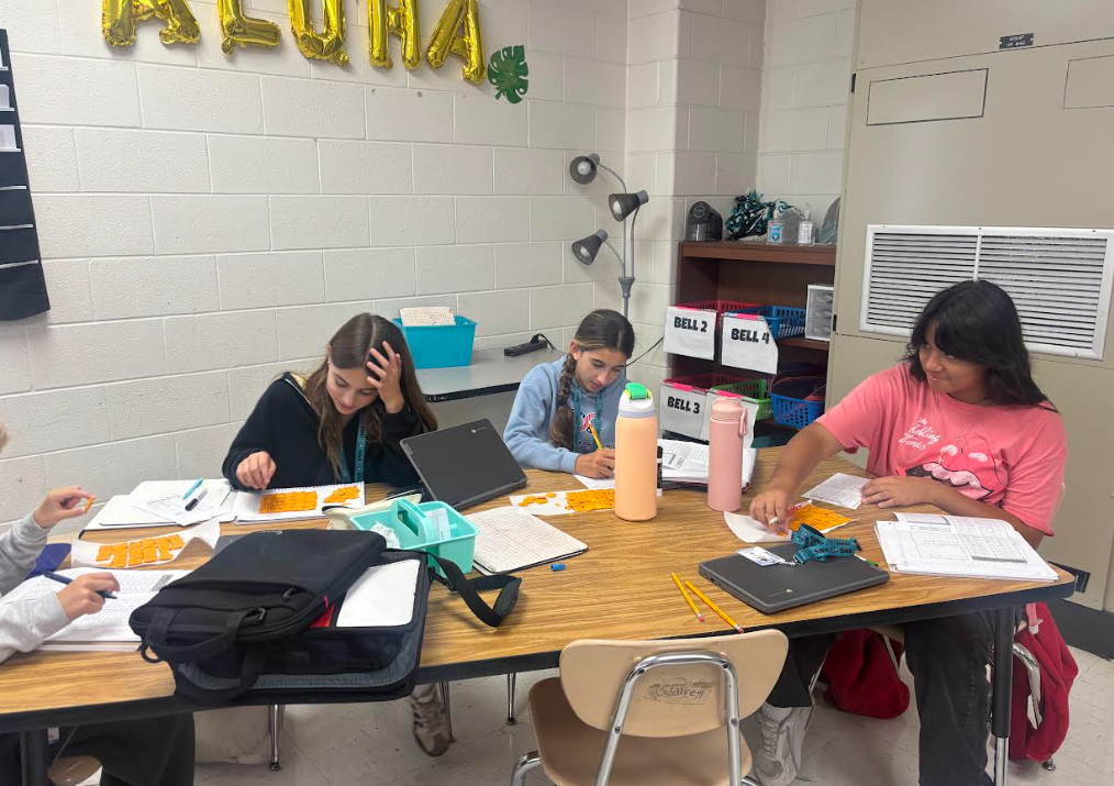 students in math working with cheese-its