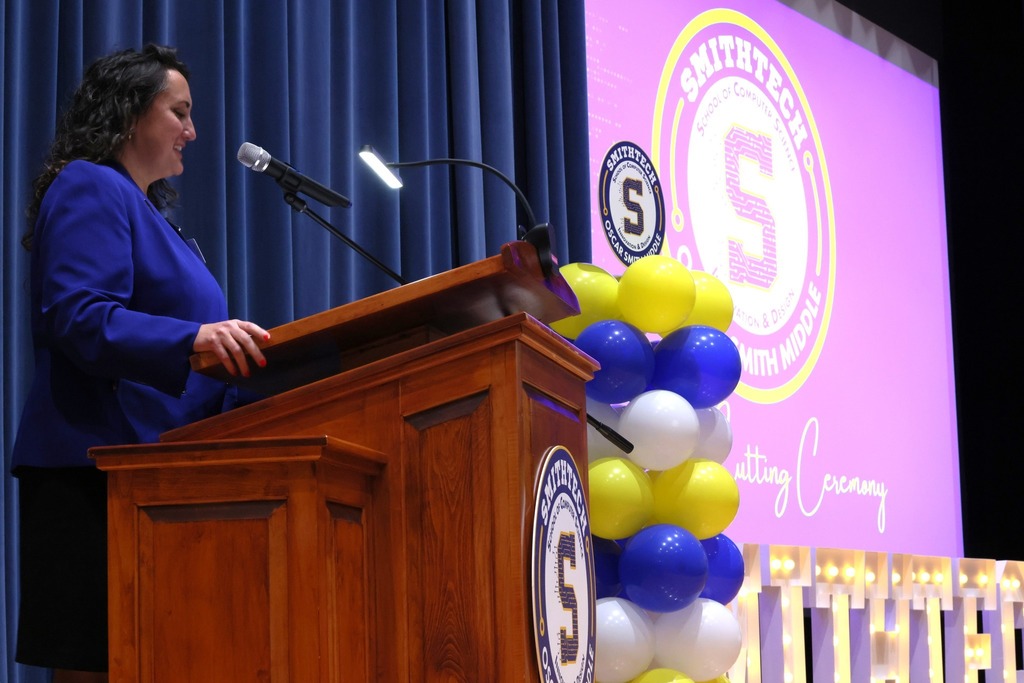 Principal at podium