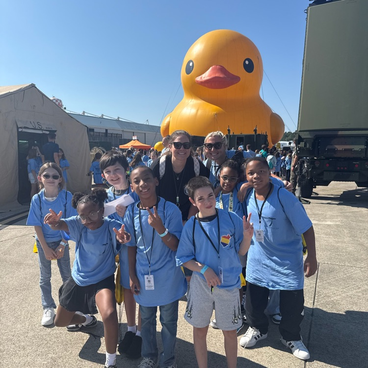 students teachers and the big yellow duck