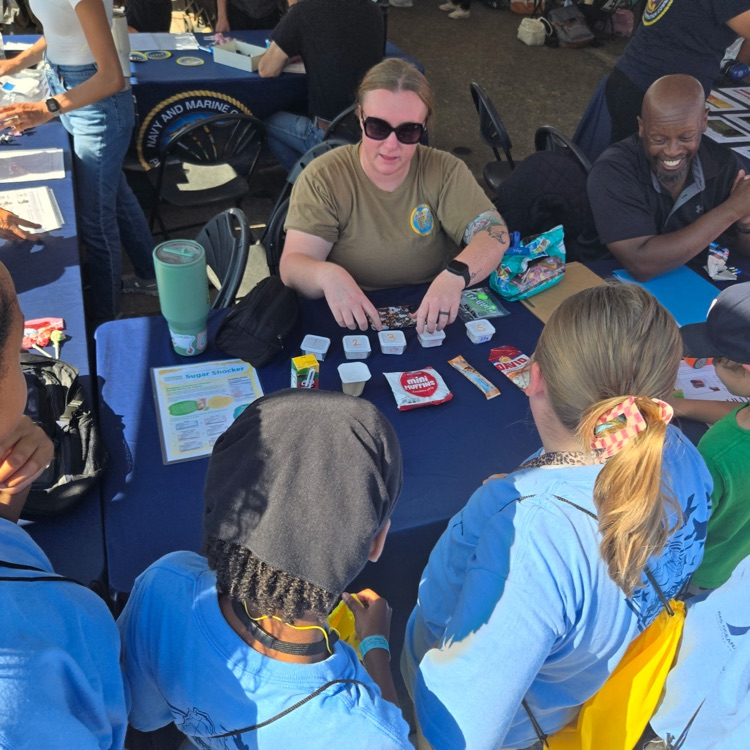 students around a stem table 