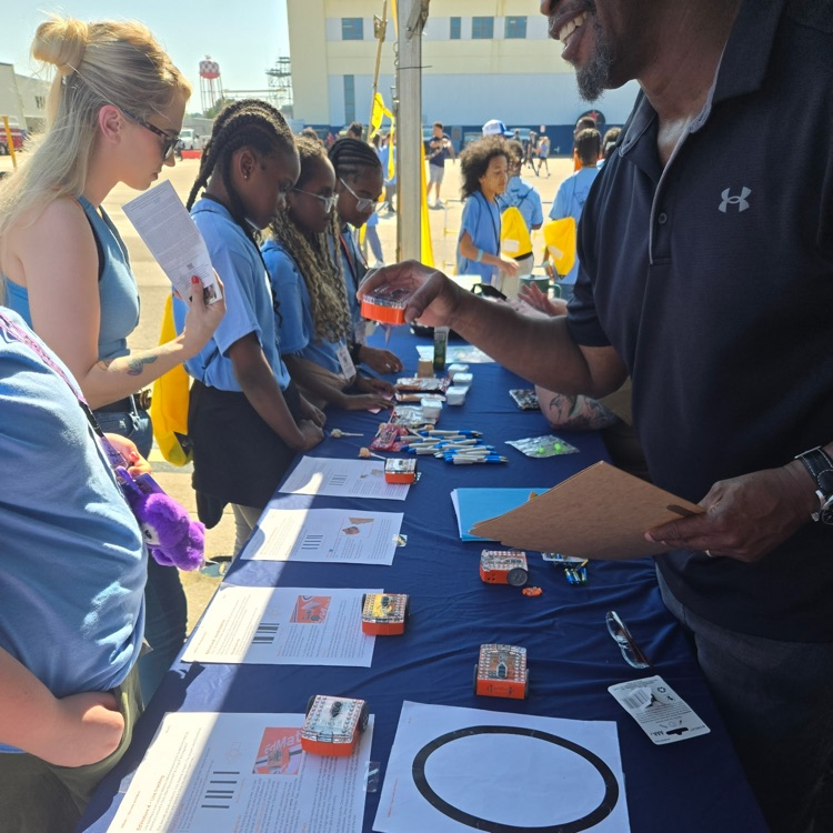students around a stem table booth 