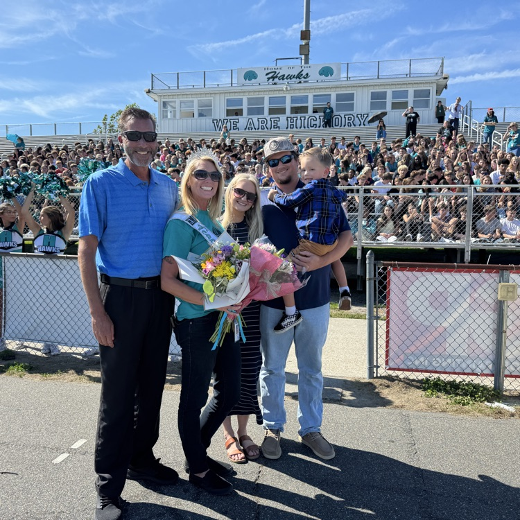 teacher of the year with her family in the stadium 