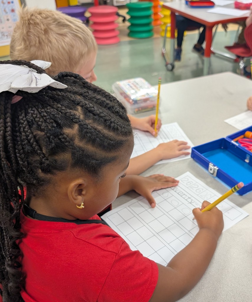 Wear red day with Mrs. Wolff's class.  Students are learning about and how to write the number 26. 