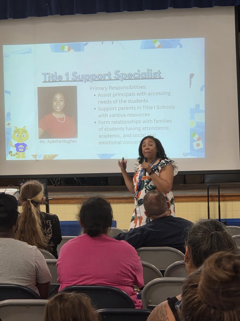 Mrs. Hughes explaining Title I