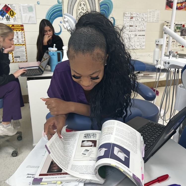 dental students working on a project