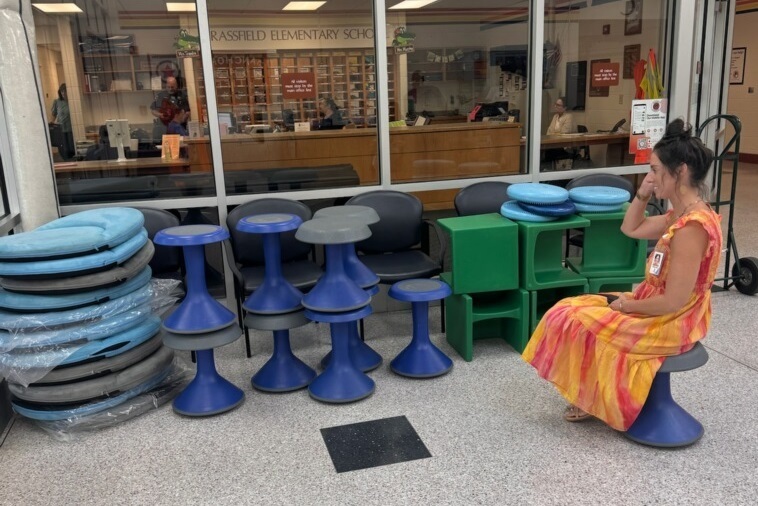 Dr. Carter contemplating the ideal home for these instructional resources