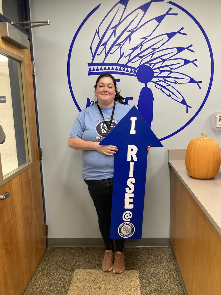 Mrs. Caswell with RISE Recognition Sign