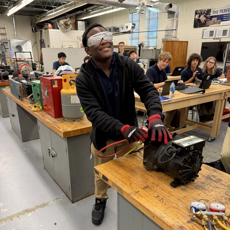 hvac students competing to connect manifold gauges 
