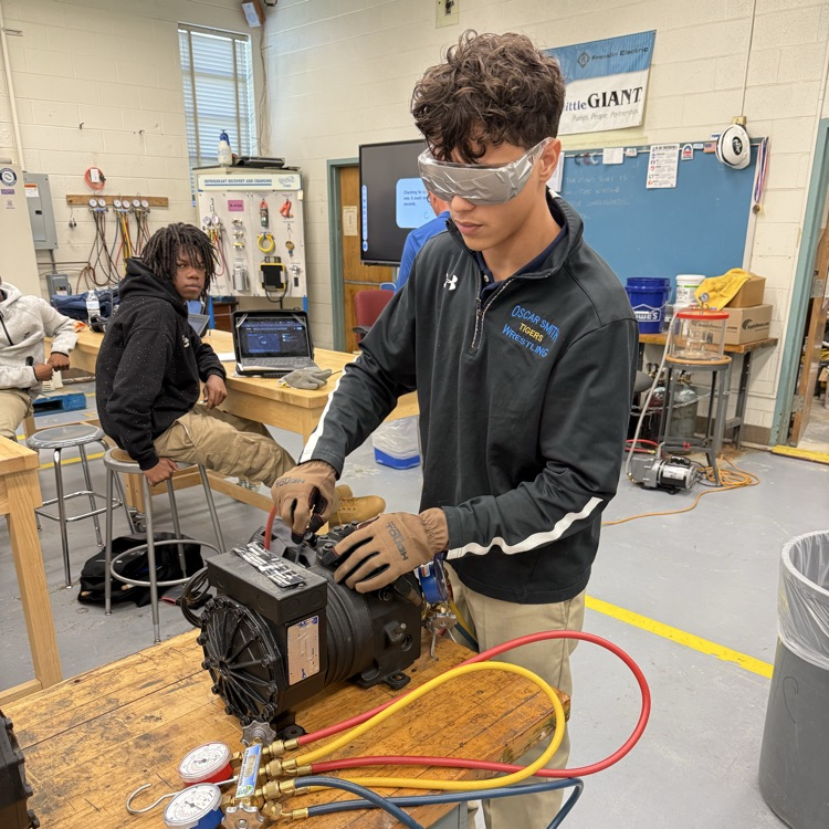 hvac students competing to connect manifold gauges 
