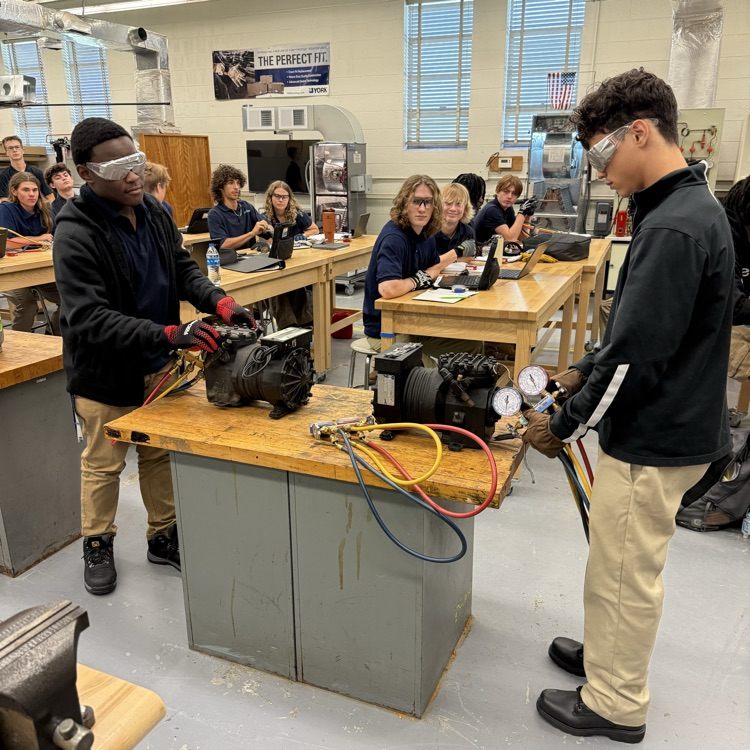 hvac students competing to connect manifold gauges 