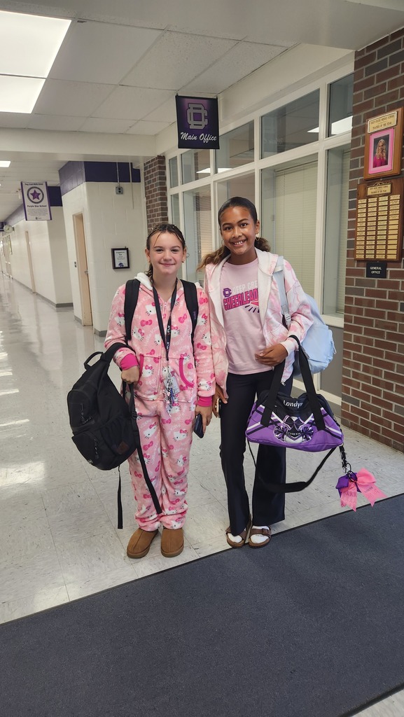 two students in pink or Spirit Day