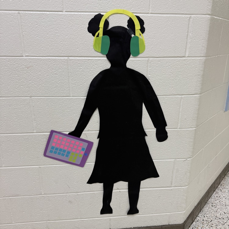 silhouette of a disability- wearing noise canceling headphones