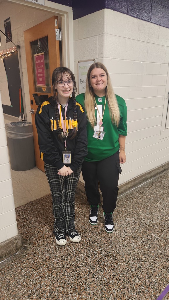 a student and teacher wearing jerseys