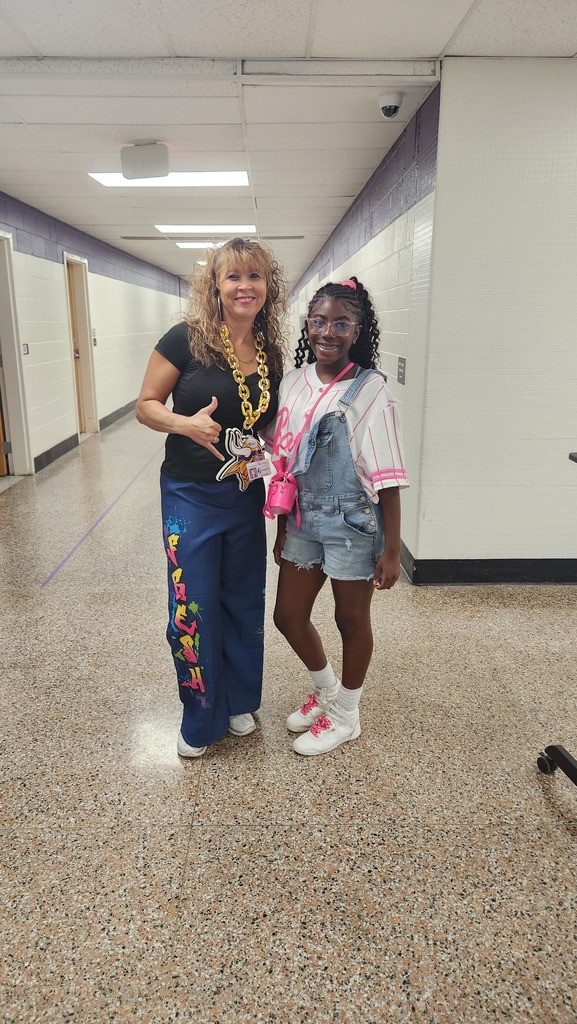 A teacher and student in 90s gear!