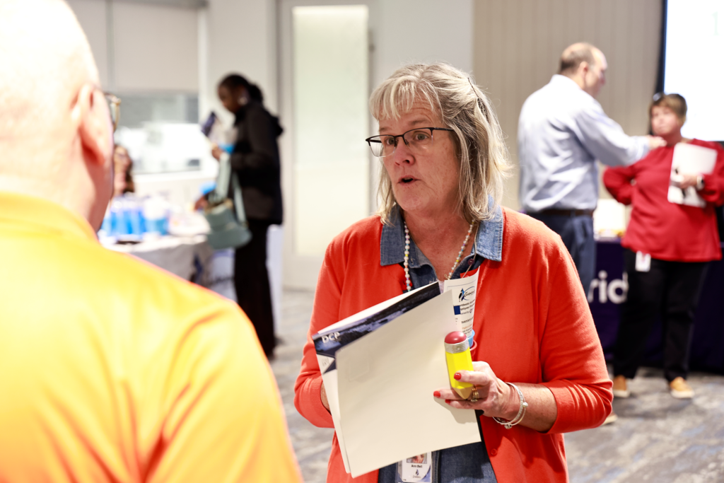 woman talking to vendor