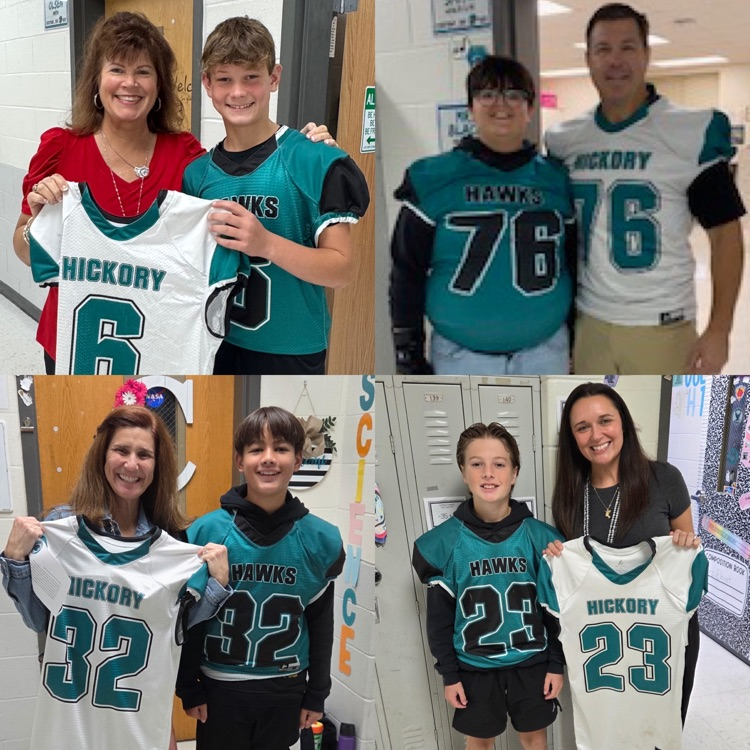 football players giving jersey to educator
